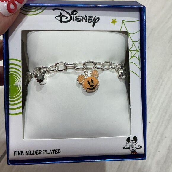 Disney Jewelry - Disney fine silver-plated adjustable charm bracelet featuring a Mickey Mouse jac